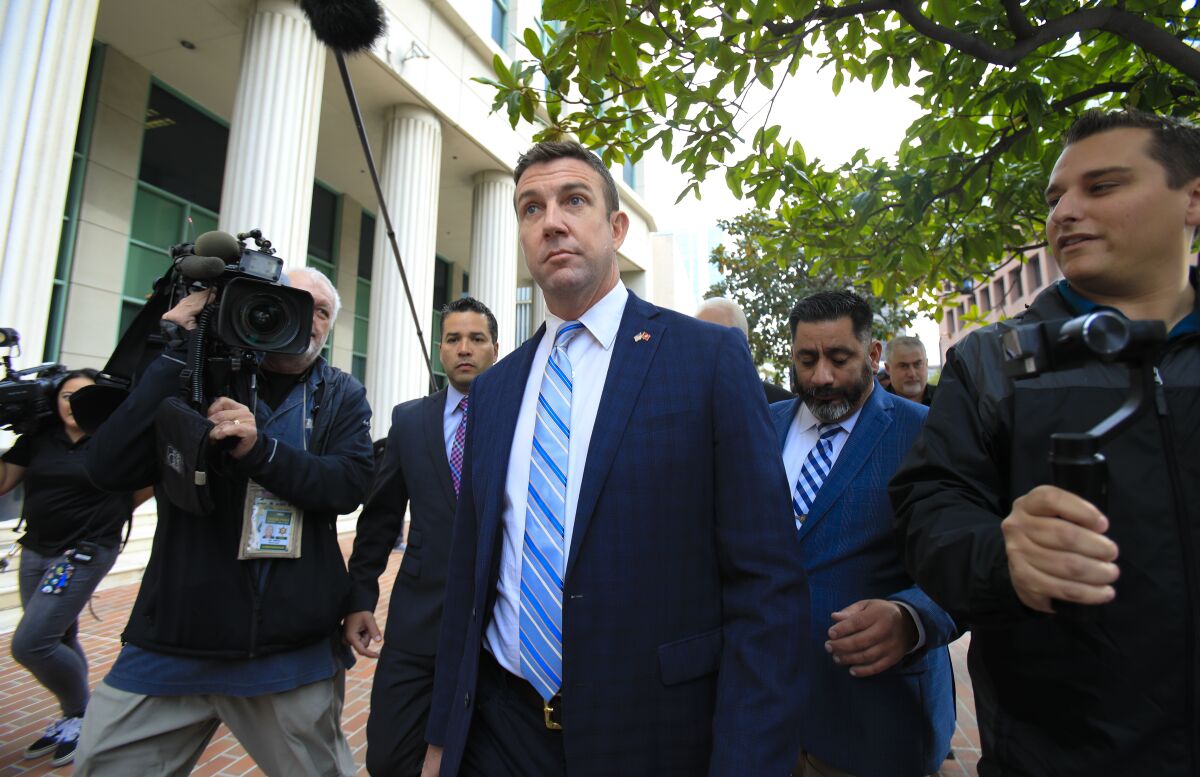 Congressman Duncan Hunter leaves San Diego federal court after entering a guilty plea in his federal campaign finance case Tuesday, Dec. 3, 2019.