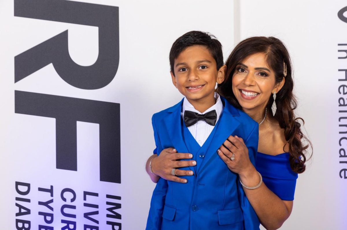 Rupali Pai poses for a picture with Riaan, then 7, at a gala hosted by the JDRF in 2022.