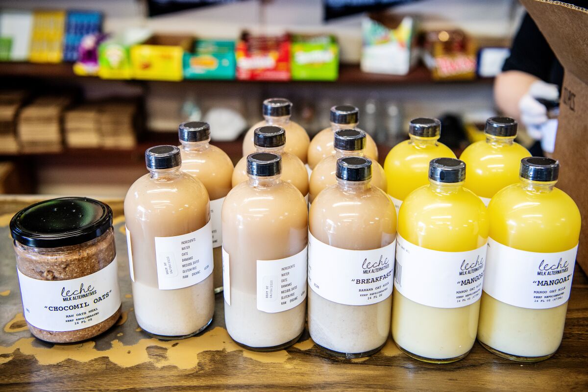 A variety of oat milks from Leche on display at Sara's Market.
