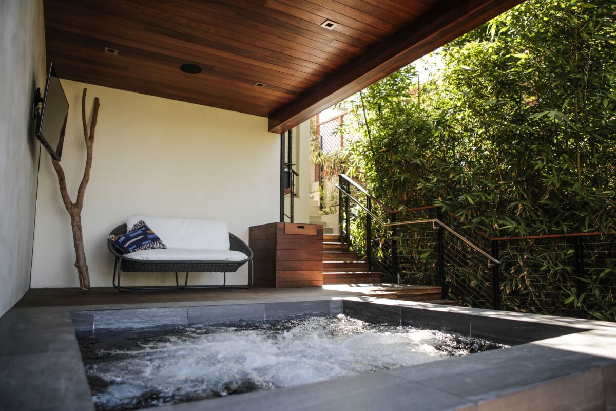 The second floor of the home offers a spa with a jet pool.