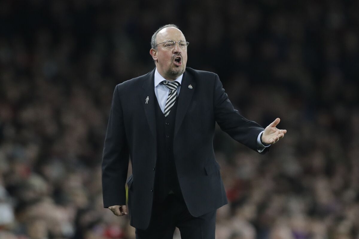 FILE - In this file photo dated Monday, April 1, 2019, Newcastle's manager Rafael Benitez during the English Premier League soccer against Arsenal at Emirates stadium in London. Away from the Premier League’s title favorites stands a collection of outsiders looking to push into European contention or solidify themselves as established members in the world’s richest league. Is the marriage of Everton and its newly appointed manager Rafa Benitez heading for a quick divorce? (AP Photo/Kirsty Wigglesworth, FILE)