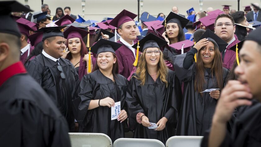 L.A. Unified estimated that 56% of all students in the class of 2017 earned a C or higher in the classes necessary to apply to Cal State. Above, a 2017 graduation.