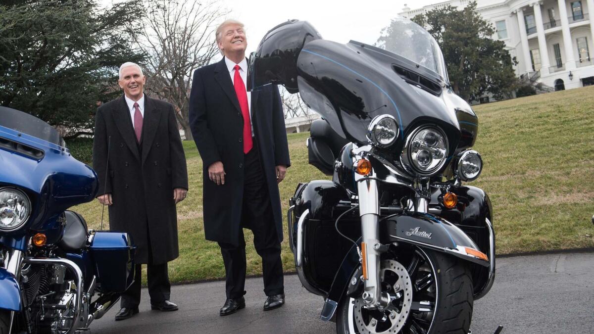 President Trump jokes with reporters after greeting Harley Davidson executives and union representatives on the South Lawn of the White House in February 2017.