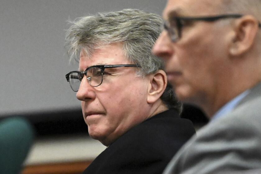 FILE - Defendant Kevin Monahan, left, listens to opening statements in his murder trial, Jan. 11, 2024, at the Washington County Courthouse in Fort Edward, N.Y. Monahan, who fatally shot a 20-year-old woman when the SUV she was riding in mistakenly pulled into his rural driveway, could face decades in prison at his sentencing, which is scheduled for Friday, March 1, 2024. (Will Waldron/The Albany Times Union via AP, Pool, File)