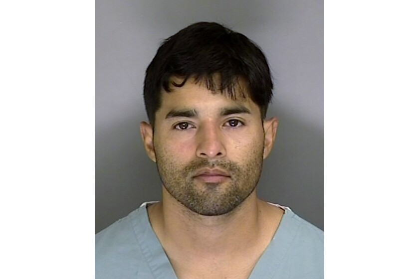 FILE - This Sunday, June 7, 2020, booking photo from the Santa Cruz County Sheriff's Office shows 32-year-old suspect Steven Carrillo. The Air Force sergeant already jailed in the ambush killing of a California sheriff's deputy was charged Tuesday, June 16, 2020 in the shooting death of a federal security officer outside the U.S. courthouse in Oakland during a night of violent protest last month. Staff Sgt. Steven Carrillo was charged with murder and attempted murder in the killing of federal officer Dave Patrick Underwood, 53. He died from gunshot wounds and another federal officer was critically injured in the drive-by shooting outside the Ronald V. Dellums Federal Building on May 29. (Santa Cruz Sheriff's Office via AP, File)