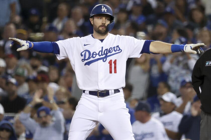 Taylor hits 3 HRs, Dodgers beat Braves 11-2 to extend NLCS