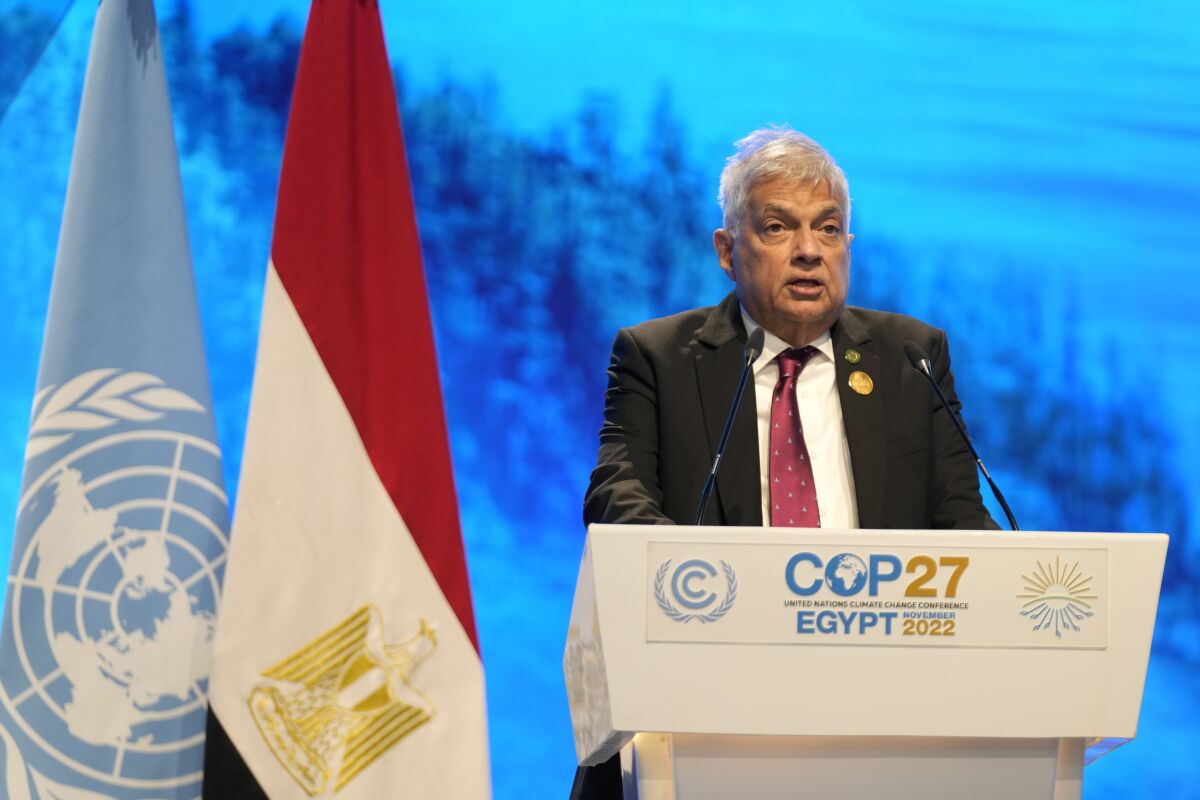 FILE - Sri Lankan President Ranil Wickremesinghe speaks at the COP27 U.N. Climate Summit in Sharm el-Sheikh, Egypt, Tuesday, Nov. 8, 2022. Wickremesinghe suspended Parliament until Feb. 8, when he said he would announced a new set of long-term policies to address a range of issues including an unprecedented economic crisis that has engulfed the Indian Ocean island nation for months. (AP Photo/Peter Dejong, File)