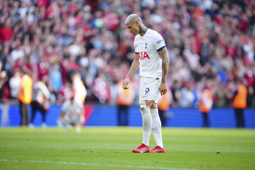 Tottenham's Richarlison reacts in disappointment at the end of the English Premier League soccer match between Liverpool and Tottenham Hotspur at Anfield Stadium in Liverpool, England, Sunday, May 5, 2024. (AP Photo/Jon Super)