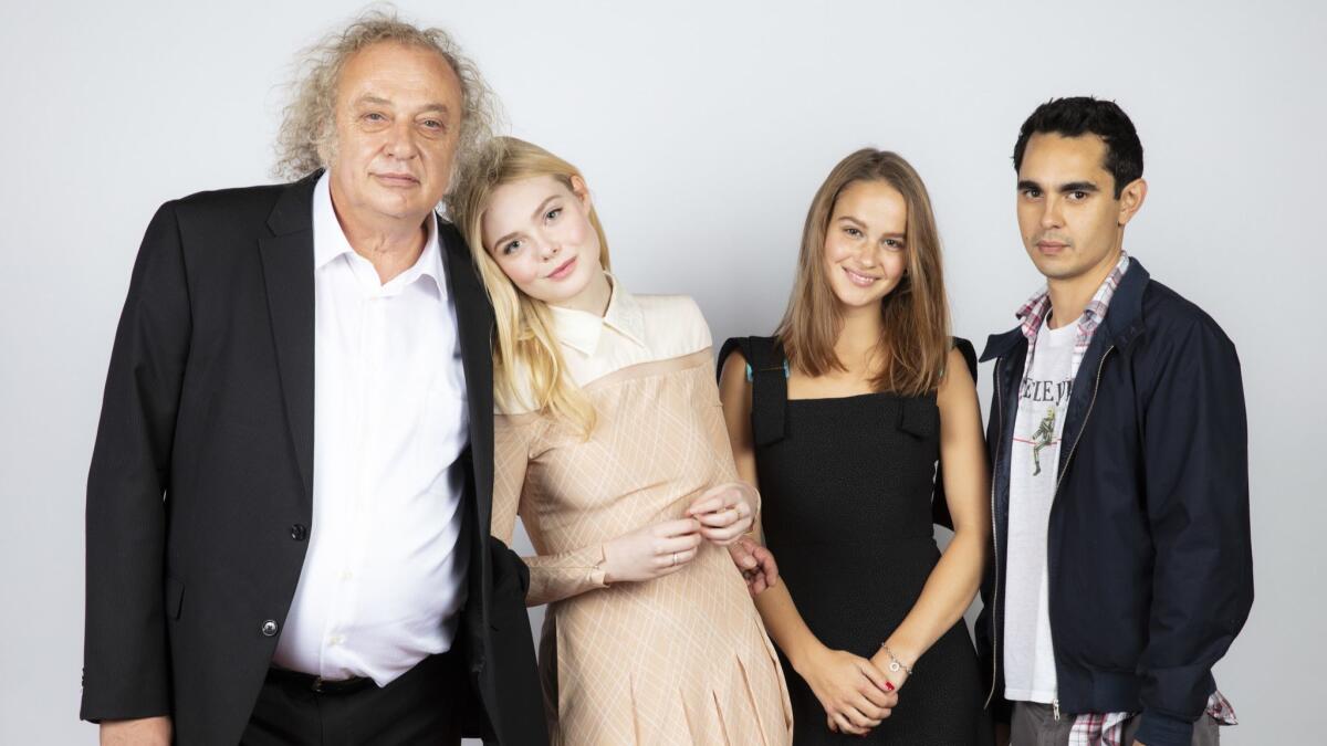 Actors Zlatko Buric, Elle Fanning, Clara Regard and director-writer Max Minghella at the Toronto International Film Festival in 2018.