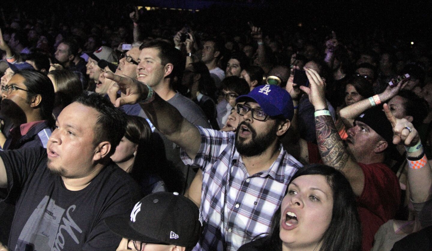 Fans voice their appreciation for Pearl Jam at the L.A. Sports Arena on Nov. 23, 2013.