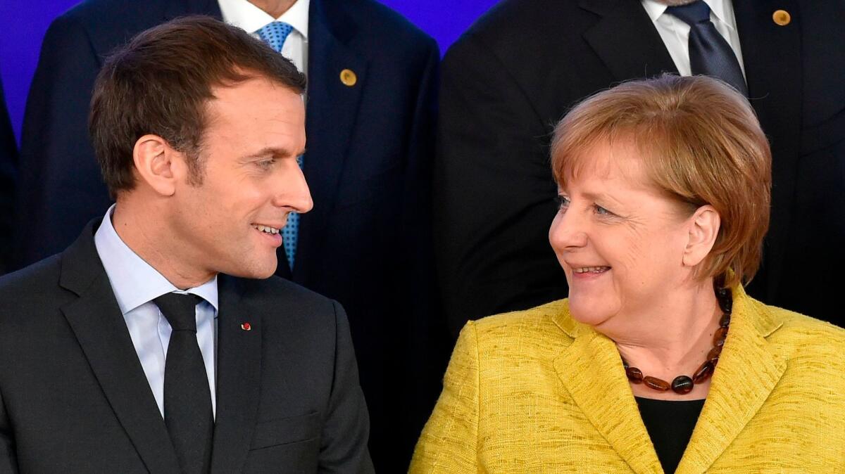 French President Emmanuel Macron and German Chancellor Angela Merkel.