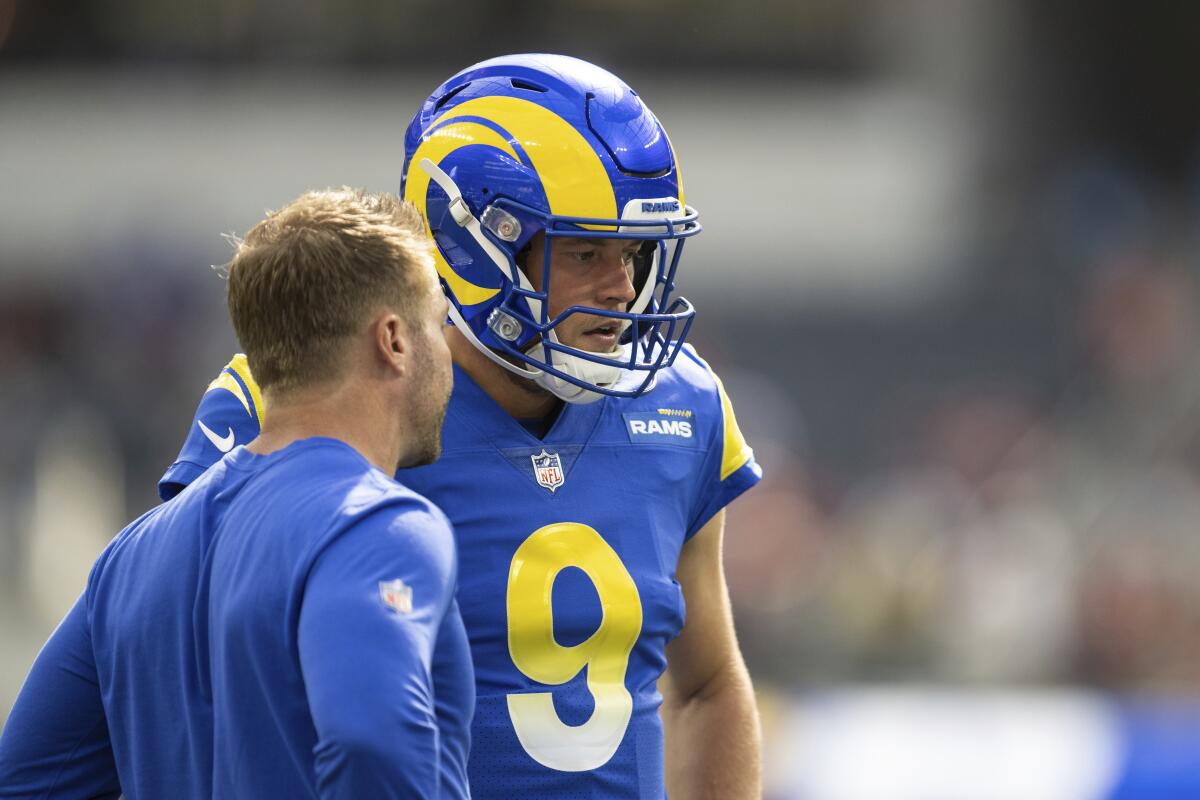 Rams quarterback Matthew Stafford talks to coach Sean McVay before a loss to the San Francisco 49ers.