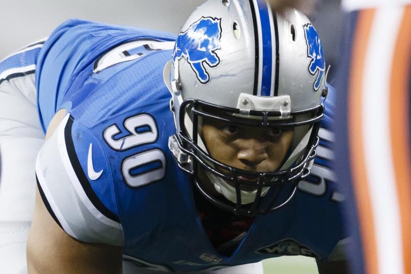 Detroit Lions defensive tackle Ndamukong Suh, lining up during a win over the Chicago Bears on Thanksgiving Day, is the prize of the NFL's free-agent class.