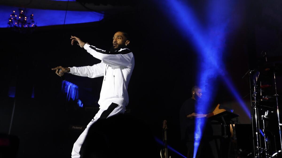 Rapper Nipsey Hussle performs work from his Grammy-nominated album "Victory Lap" at the Palladium in Hollywood in 2018.