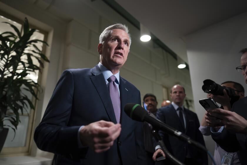Speaker of the House Kevin McCarthy, R-Calif., talks to reporters after a closed-door meeting with Rep. Matt Gaetz, R-Fla., and other House Republicans after Gaetz filed a motion to oust McCarthy from his leadership role, at the Capitol in Washington, Tuesday, Oct. 3, 2023. (AP Photo/J. Scott Applewhite)