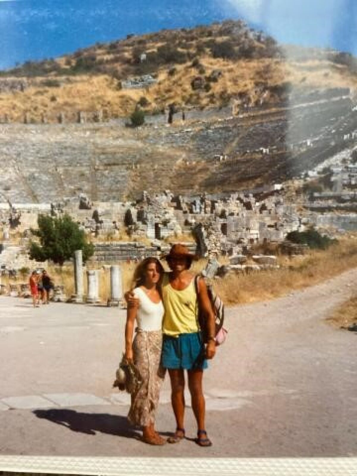 Tina and Peter Andrew during their travels to Turkey in the 1990s and the ruins of the Greek amphitheater in Ephesus.