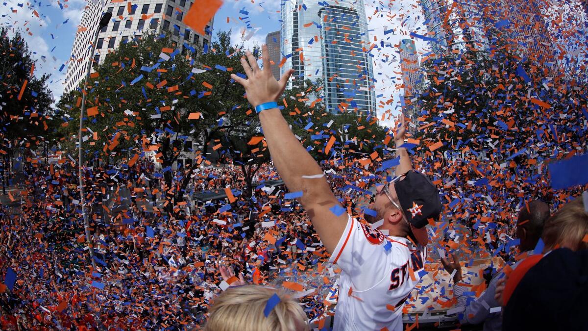 World Series MVP George Springer celebrates during the Astros championship parade Friday in Houston.