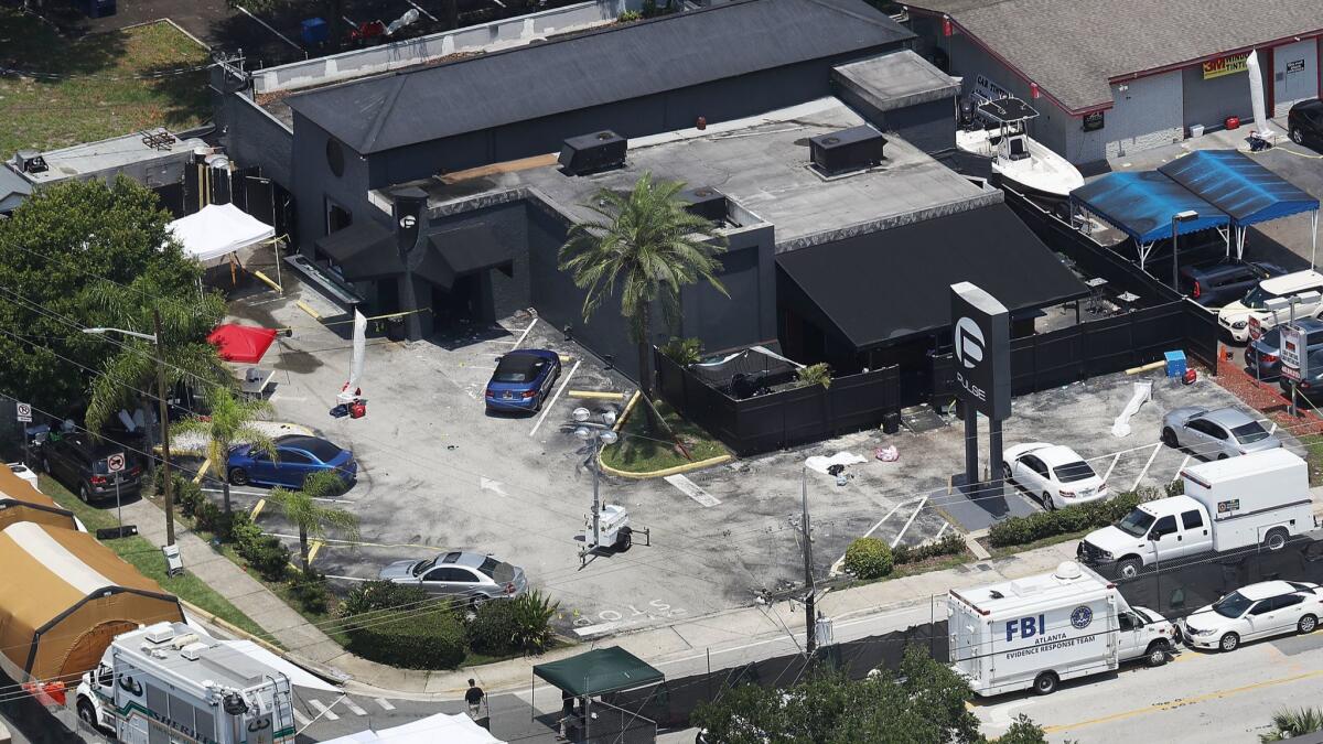 ORLANDO, FL - JUNE 13: Law enforcement officials investigate at the Pulse gay nightclub where Omar Mateen allegedly killed at least 50 people on June 13, 2016 in Orlando, Florida. The mass shooting killed at least 50 people and injuring 53 others in what is the deadliest mass shooting in the country's history. (Photo by Joe Raedle/Getty Images) ** OUTS - ELSENT, FPG, CM - OUTS * NM, PH, VA if sourced by CT, LA or MoD **