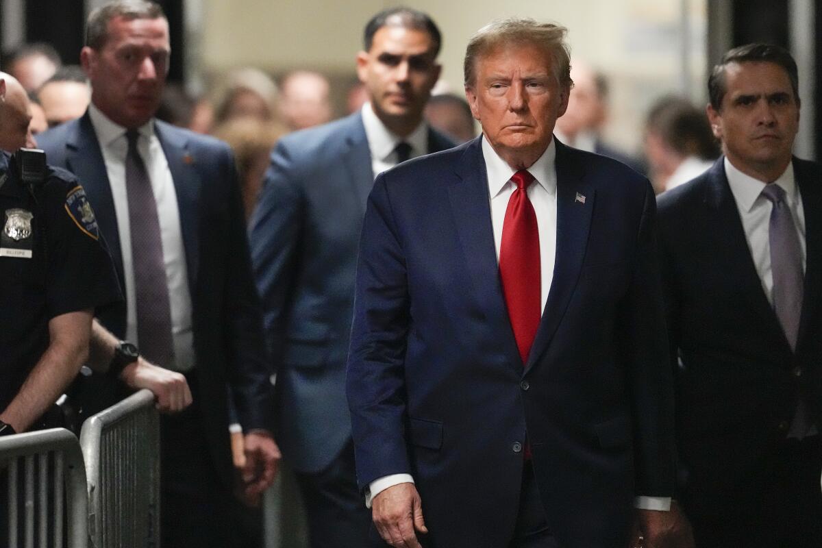 Former President Trump arrives at Manhattan criminal court in New York on Feb. 15. 