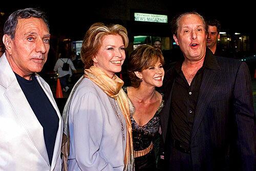 The onetime home of "Exorcist" writer William Peter Blatty  seen here, at left, in 2000 with the film's director, William Friedkin, and stars Ellen Burstyn, second from left, and Linda Blair  is on the market for $27 million.