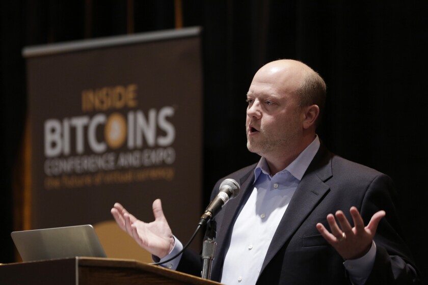 FILE - Jeremy Allaire, Founder and CEO of Circle Internet Financial, a Boston-based digital currency company, speaks at the Inside Bitcoins conference and trade show on April 7, 2014 in New York. Allaire was one of several Cryptocurrency executives who went to Capitol Hill on Wednesday, Dec. 8, 2021, to say their fast-growing industry understands more regulation is likely coming, but they don’t want it to squelch the next wave of the internet or send it offshore to other countries. (AP Photo/Mark Lennihan, File0