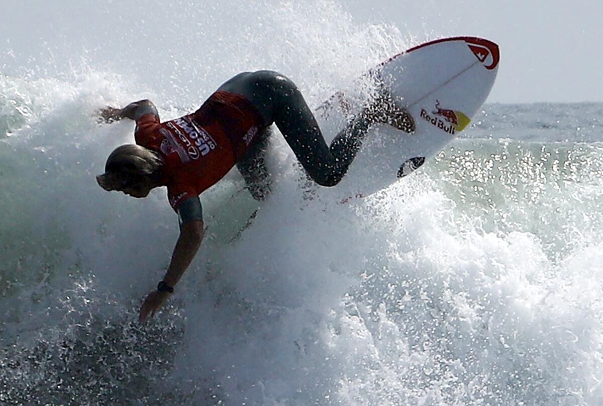 Kanoa Igarashi of Huntington Beach turns on a wave during the U.S. Open of Surfing.