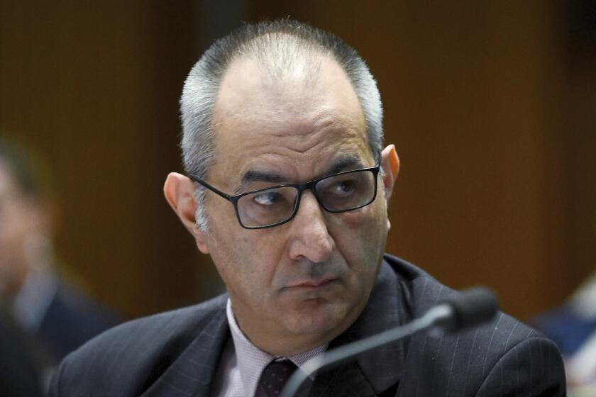Australia's Secretary of the Department of Home Affairs Michael Pezzullo attends a senate estimates session at Parliament House in Canberra, on Feb. 13, 2023. Pezzullo has stood aside, Monday, Sept. 25, 2023, while he is investigated over allegations that he had used encrypted texts to lobby for and against various government ministers to further his own career. (Lukas Coch/AAP Image via AP)