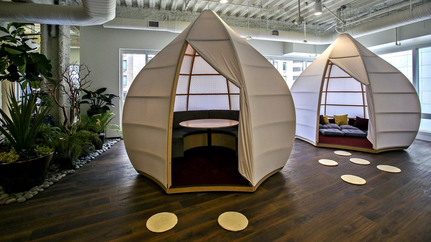 PODS IN THE SHAPE of Chinese lanterns — for meetings or solo work — were created for a law firm in the Gas Co. Tower model office suite.