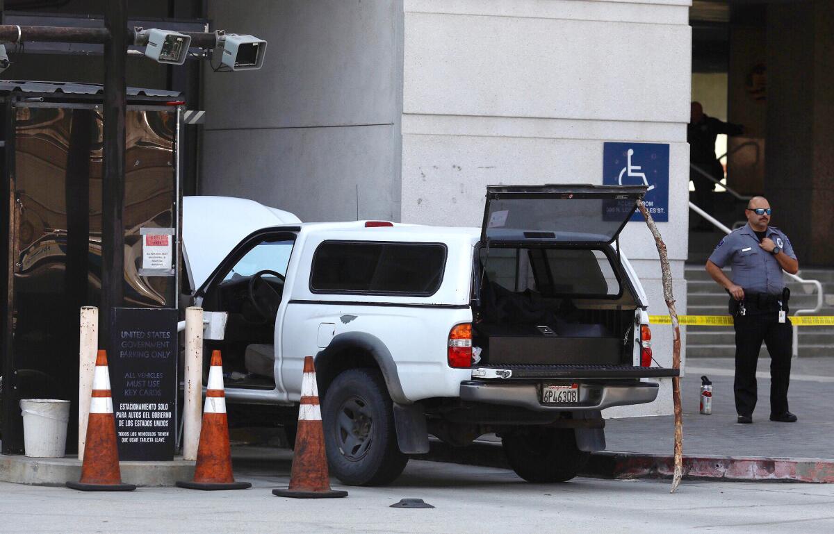 A parked truck with doors, hood and back opened.