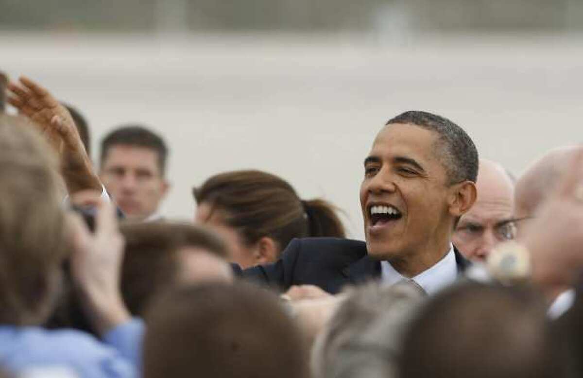 President Barack Obama greets supporters during a visit to Los Angeles in February.
