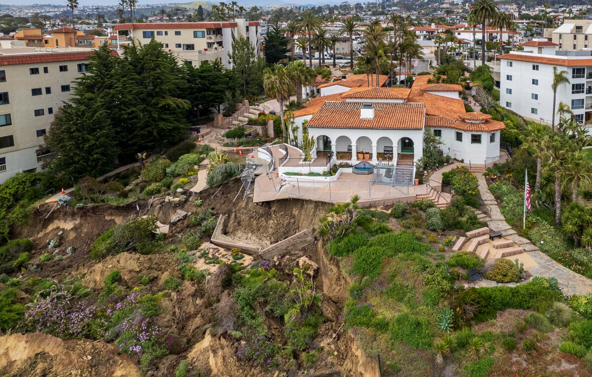 Overhead view of Casa Romantica Cultural Center and Gardens with landslide below.