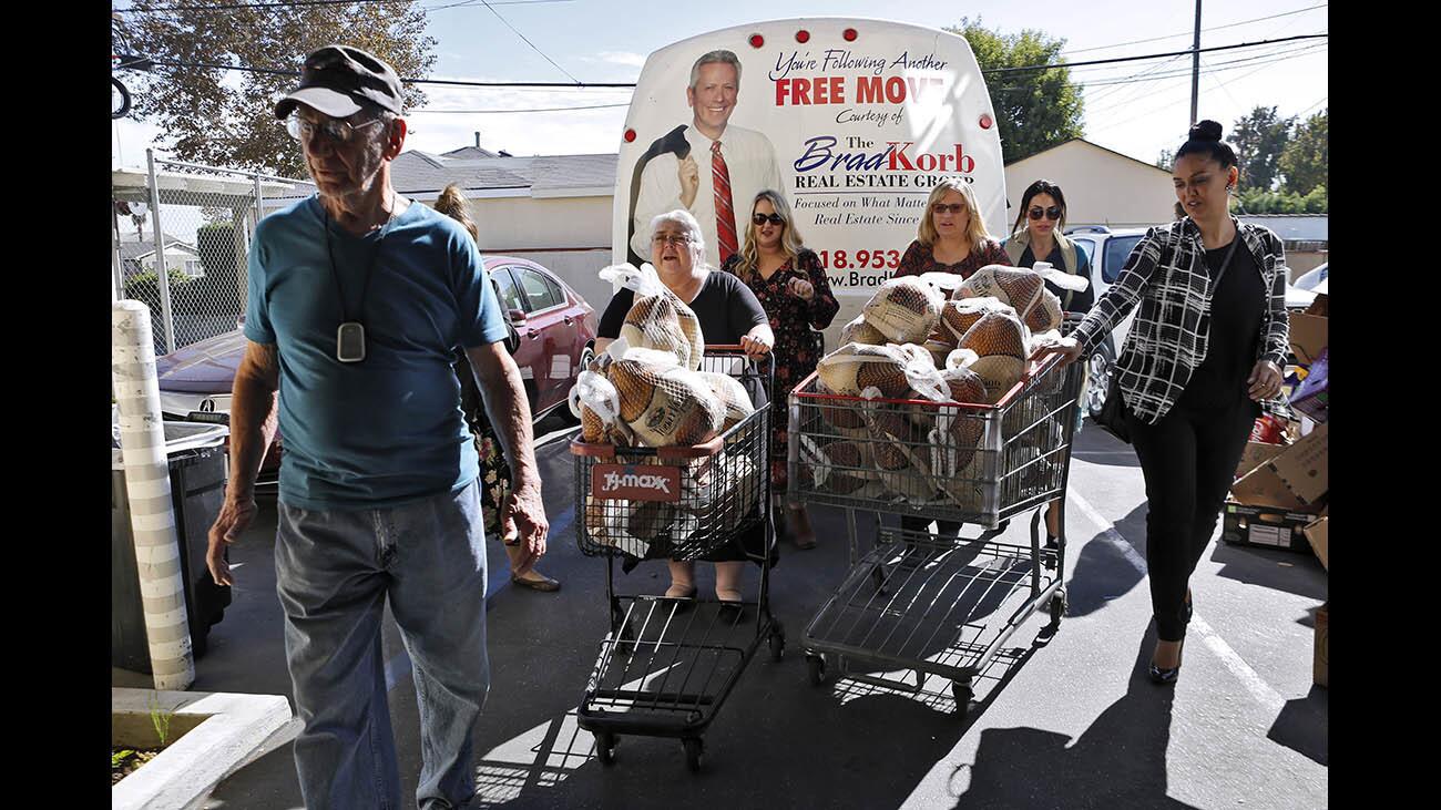 Photo Gallery: BTAC receives large donation of frozen turkeys from the Brad Korb Real Estate Group