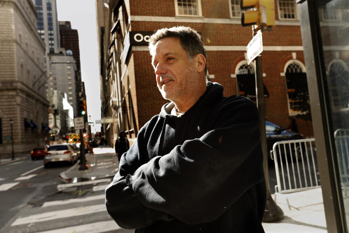 Jim McHugh stands on a Philadelphia street corner.