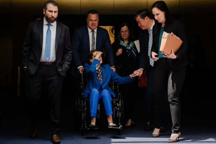WASHINGTON, DC - MAY 11: Sen. Dianne Feinstein (D-CA), flanked by staffers, departs a Senate Judiciary Committee Hearing at the Hart Senate Office Building on Thursday, May 11, 2023 in Washington, DC. This was Feinstein's first hearing after fighting illness and being absent from the Senate for almost three months. (Kent Nishimura / Los Angeles Times)