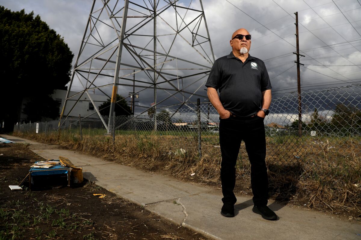 Tim Watkins in Watts, where illegal dumping has been a continuing problem.