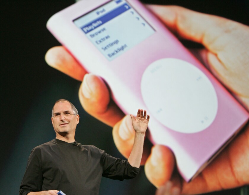 The late Steve Jobs of Apple speaks at the launch of iTunes in 2005.