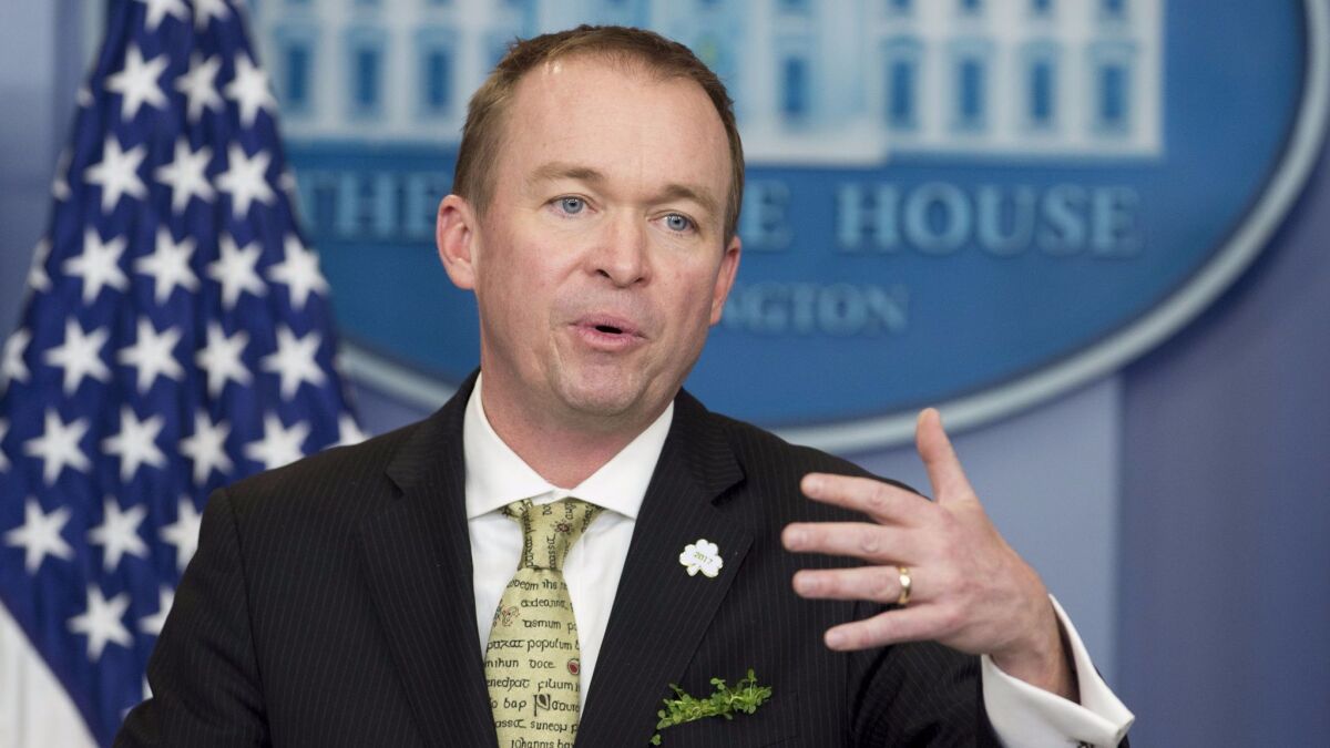 Office of Management and Budget Director Mick Mulvaney attends a March 16, 2017, news briefing in Washington.