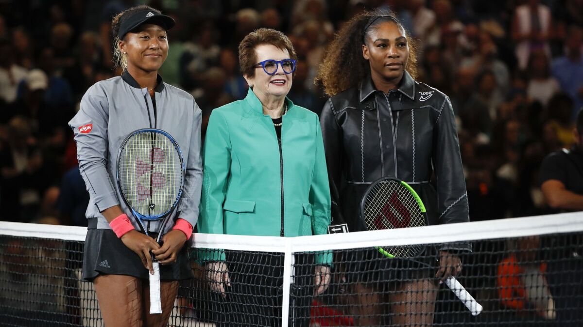 Billie Jean King stands with Naomi Osaka, left, and Serena Williams before the women's finals of the U.S. Open on Sept. 8.
