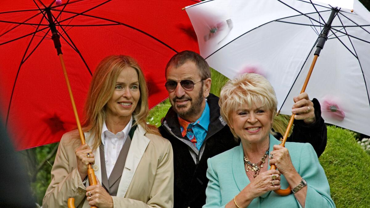 Ringo Starr and his wife Barbara Bach, left, and Gloria Hunniford at the Chelsea Flower Show.