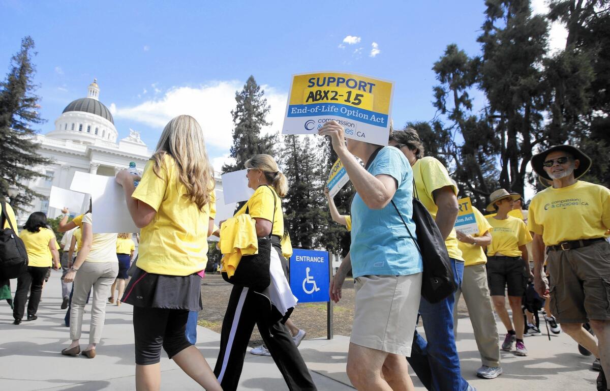 Supporters of a California measure to allow the terminally ill to end their own lives march at the state Capitol in September 2015.
