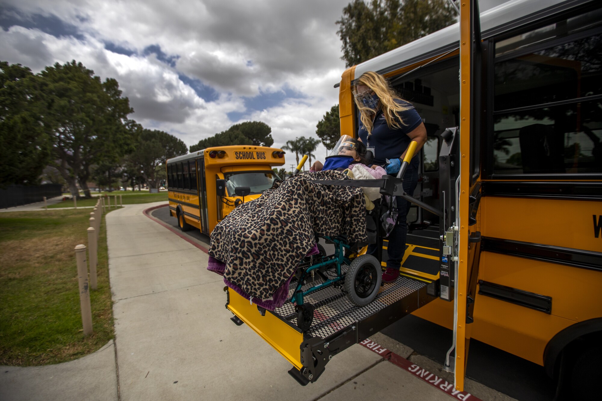 Hannah Lopez, 18, arrives by bus at California High School in Whittier.