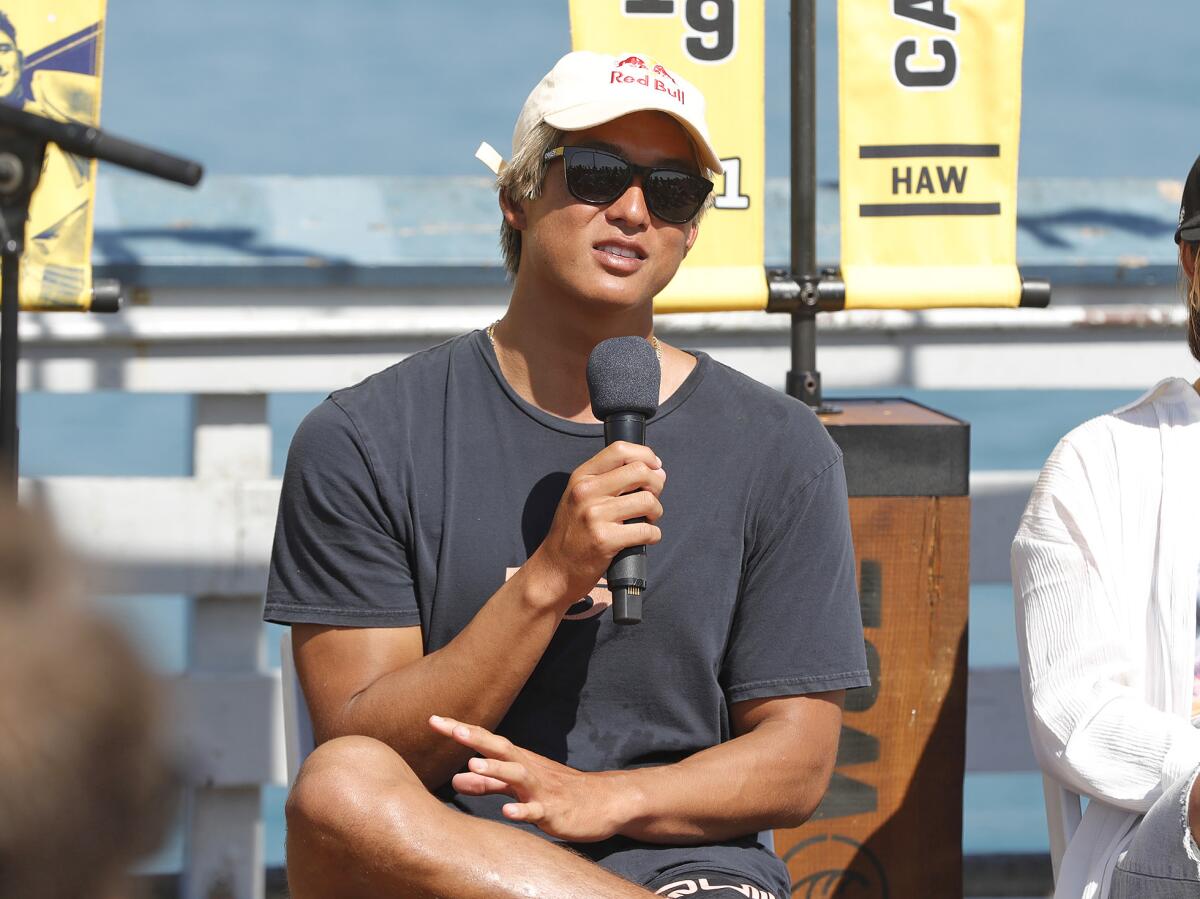 Kanoa Igarashi from Huntington Beach answers a few questions during a press conference for the World Surf League finals.