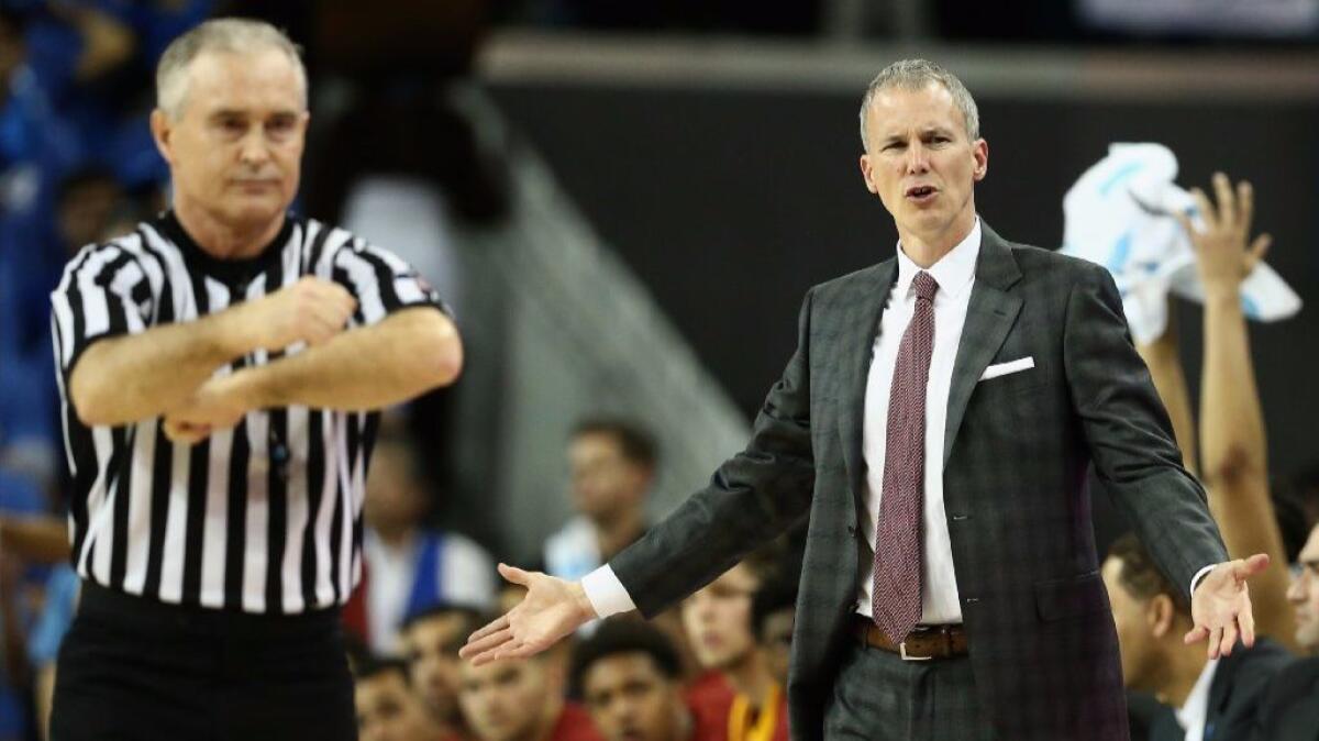 USC Coach Andy Enfield reacts to a call during the second half of a game against UCLA at Pauley Pavilion on Saturday.
