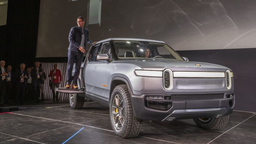 Amazon Bets On Electric Truck Maker Rivian Los Angeles Times