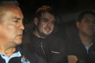 FILE - Dutch citizen Joran van der Sloot is driven in a police vehicle from a maximum-security prison to an airport to be extradited to the U.S., on the outskirts of Lima, Peru, Thursday, June 8, 2023. Van der Sloot, the chief suspect in Natalee Holloway’s 2005 disappearance, is scheduled to appear in court Wednesday morning, Oct. 18, where he is expected to plead guilty to trying to extort money from her mother and provide new information about what happened to the missing teen. (AP Photo/Martin Mejia, File)