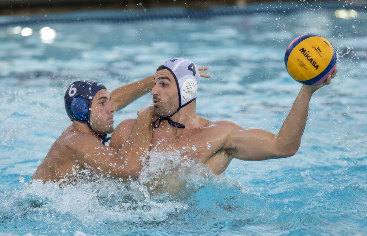 USA Water Polo's Tyler Abramson is pressured by Italy's Giacomo Cannella during an exhibition game Tuesday.