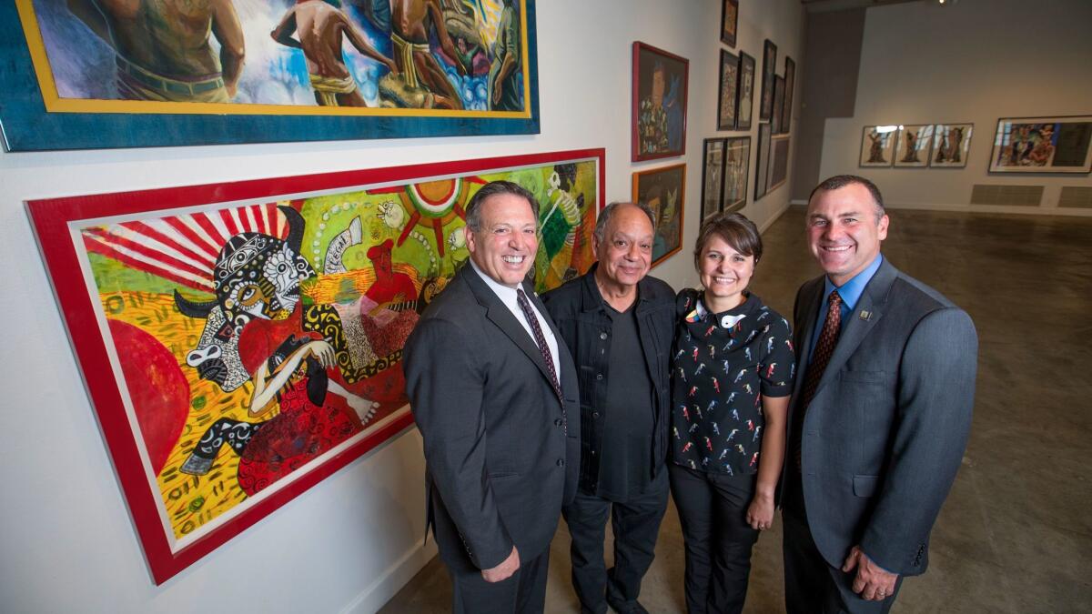 Riverside City Manager John Russo, left, actor and collector Cheech Marin, Riverside Art Museum Executive Director Drew Oberjuerge and Riverside Mayor Rusty Bailey at the Riverside Art Museum.