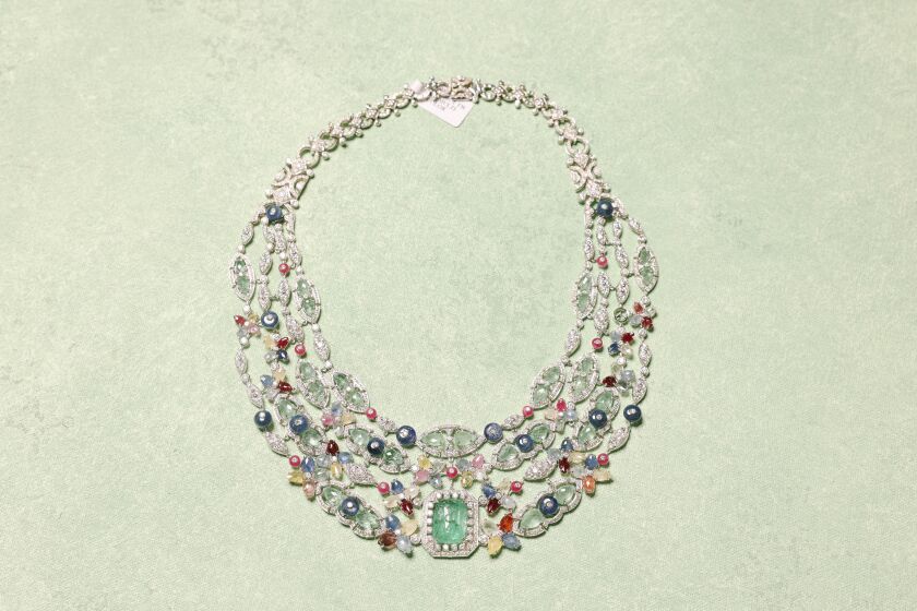 Los Angeles, CA - September 26: An 18 carrot white gold necklace with sapphire, ruby ​​and emerald necklace was seen at the jewelry store 47th & 5th on Monday, Sept.  26, 2022 in Los Angeles, CA.  The owner, Jean Malki was recently robbed from a transport vehicle carrying his jewelry.  (Dania Maxwell / Los Angeles Times)