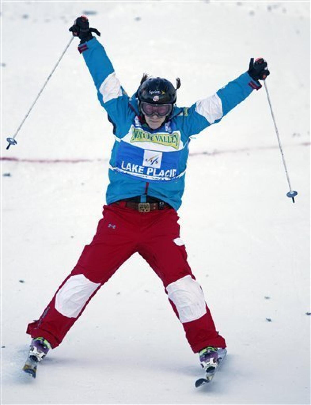 Hannah Kearney, of the United States, reacts to her first-place finish in ladies' moguls freestyle World Cup skiing event in Wilmington, N.Y., on Thursday, Jan. 21, 2010. (AP Photo/Mike Groll)
