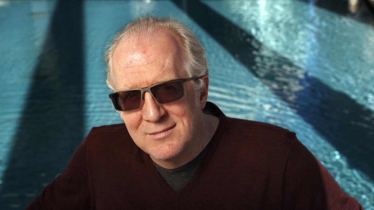 Playwright Tracy Letts, photographed by the reflecting pool of the Mark Taper Forum in downtown L.A.